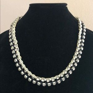 2 necklaces, 1 white and 1 black rhinestones